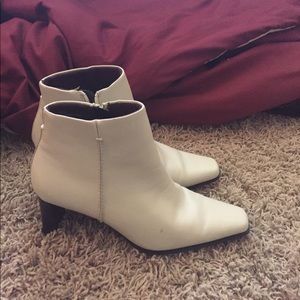 Beige leather upper ankle boots